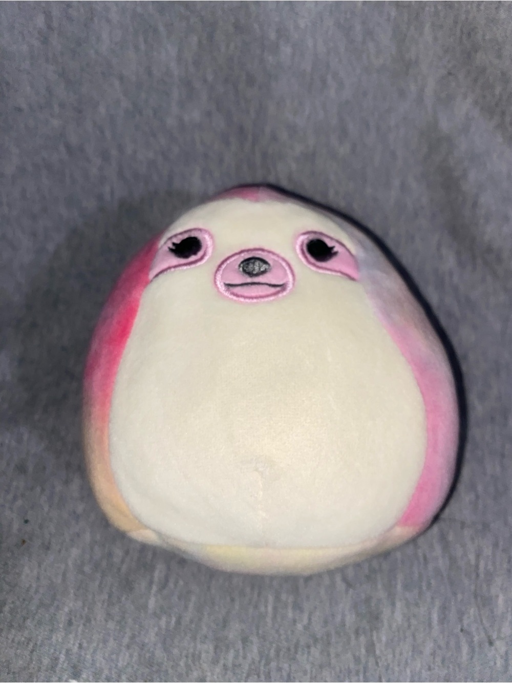 Whim the rainbow tie-dye sloth Squishmallow plush